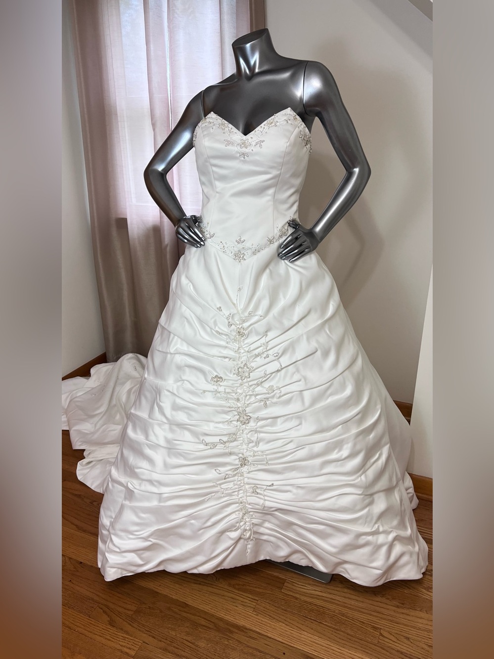 Ivory Strapless Ball Gown Wedding gown with huge cathedral train.